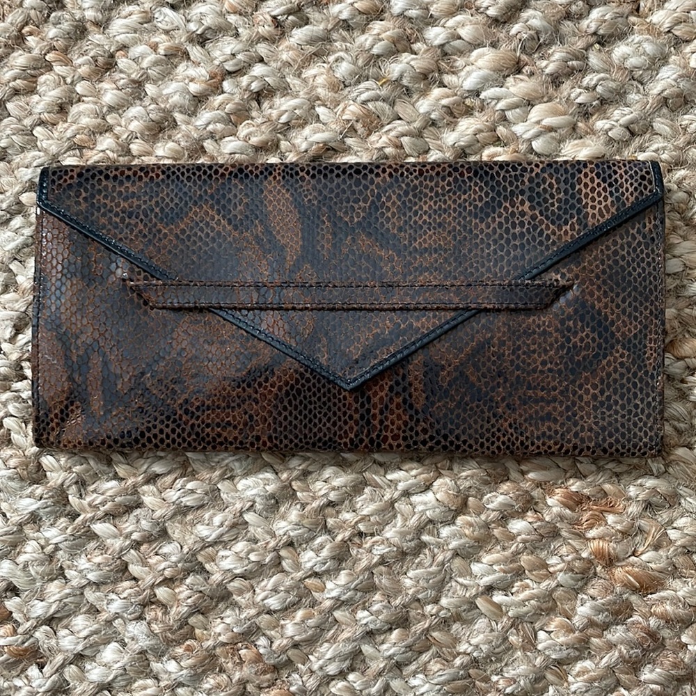 Tusk brand snake print clutch
